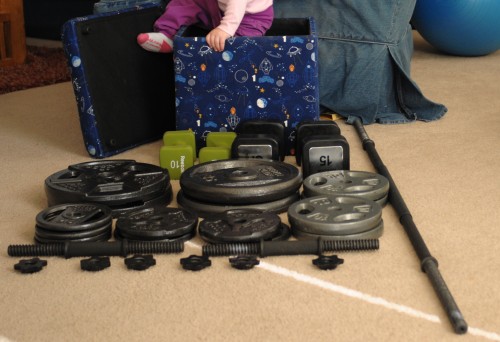 175 pounds of free weights, 50 pounds of fixed dumbbells, two adjustable dumbbells and a 10 pound barbell.